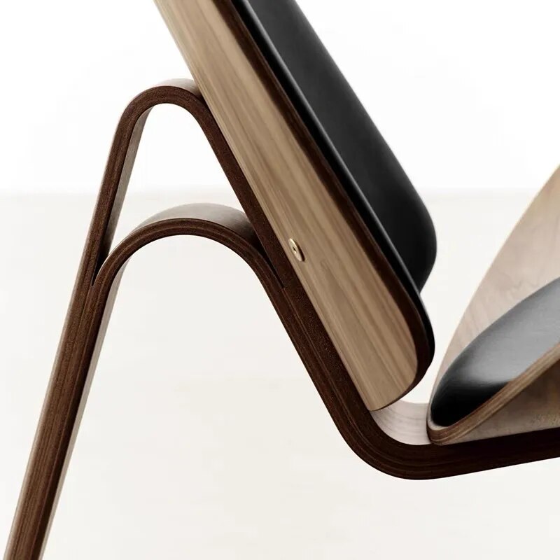 Danish Shell Chair: Sleek, Stylish, and Timeless.